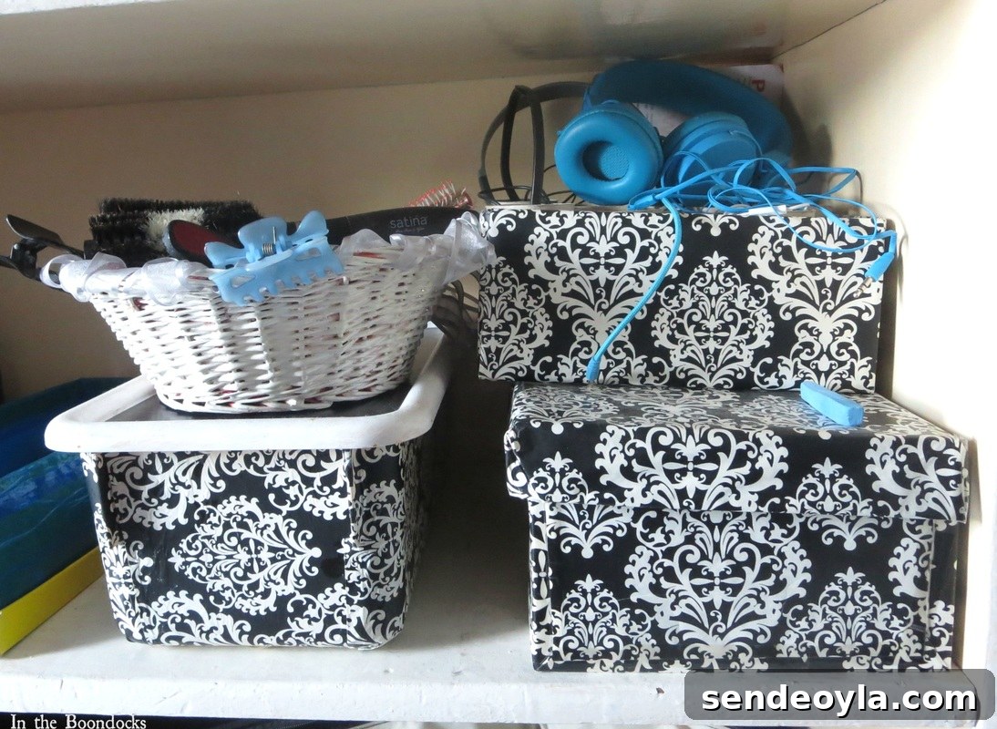 matching boxes for organization, A Tour of the Blue Room www.theboondocksblog.com