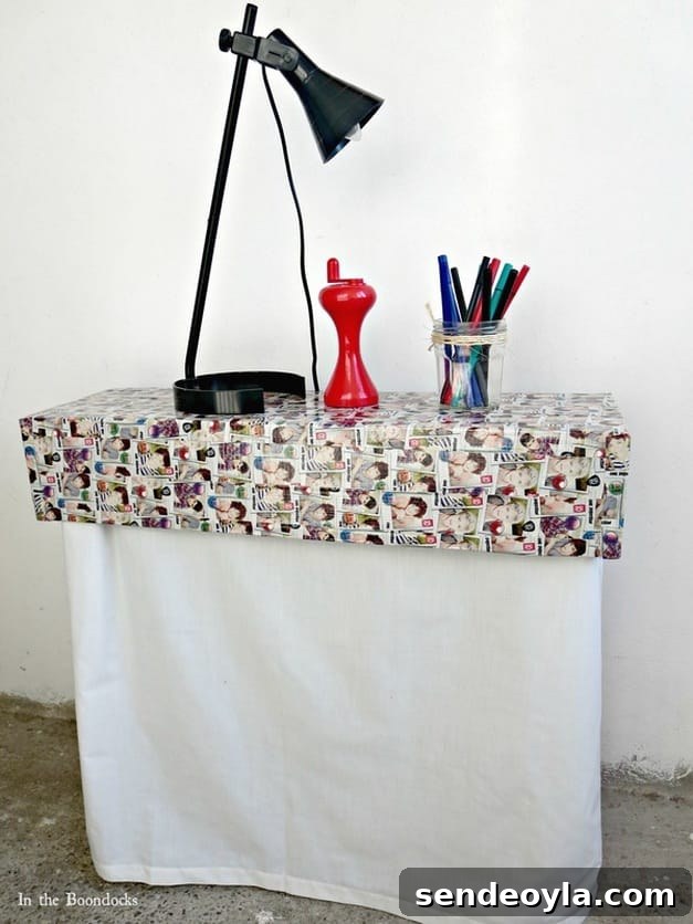Repurposing a cardboard box into a cover for a heater using washi tape of One Direction, Hiding under the wrong direction www.theboondocksblog.com
