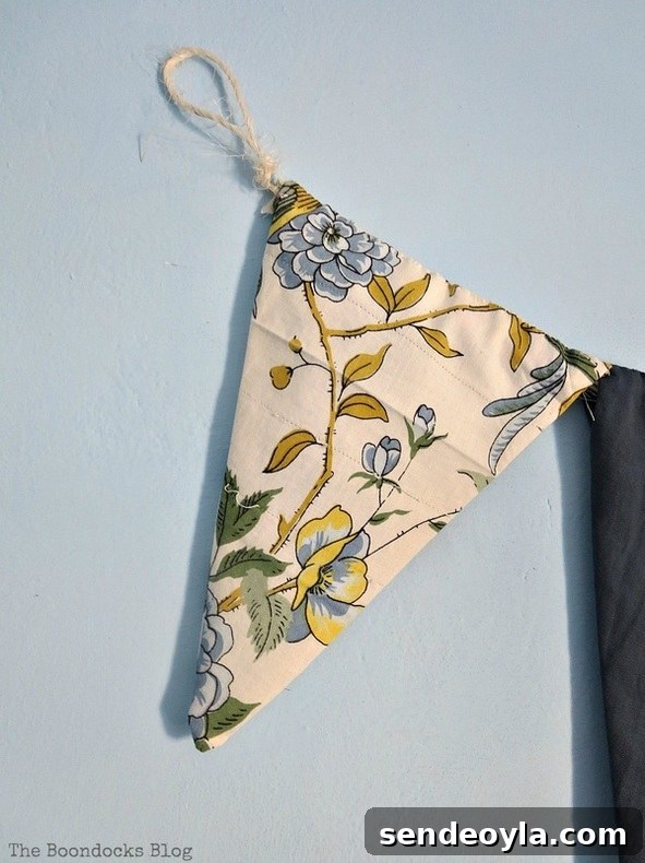 How to Make a Banner That Pops on a Blue Wall 12 Repurposing clothes and fabric scraps to make a banner, A banner for the Blue Wall www.theboondocksblog.com