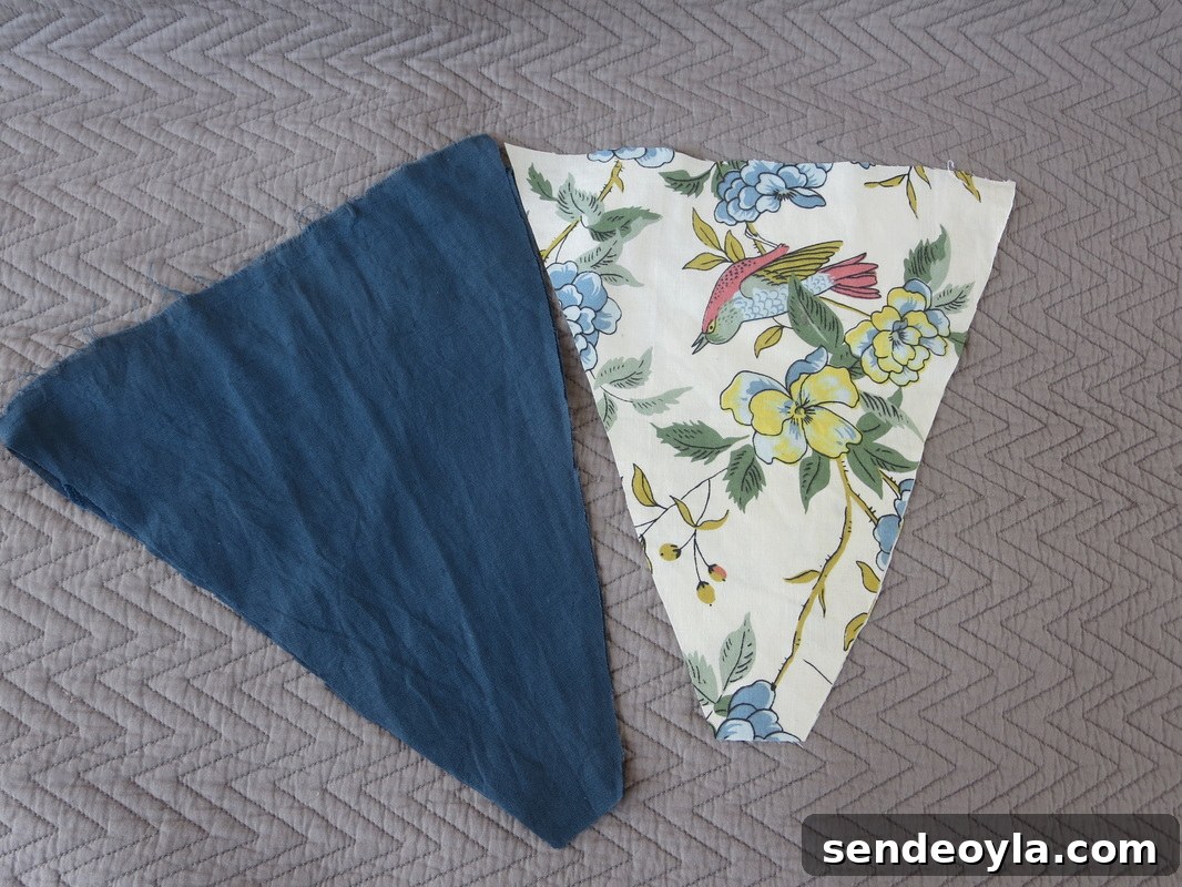 How to Make a Banner That Pops on a Blue Wall 3 cutting fabric into triangles, A banner for the blue wall the boondocksblog.com