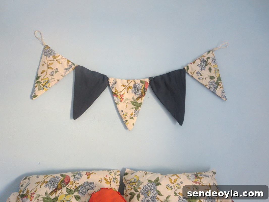 How to Make a Banner That Pops on a Blue Wall 9 Banner above pillows, A banner for the blue wall www.theboondocksblog.com