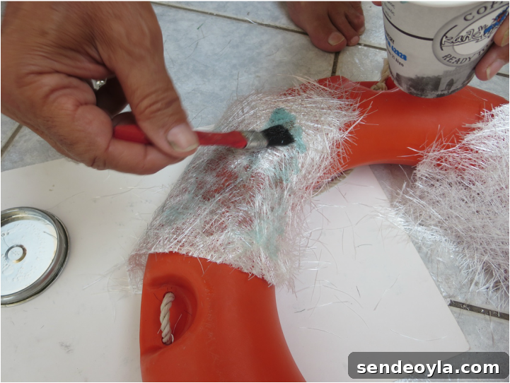 adding resin to the fiberglass, Saving the life saver