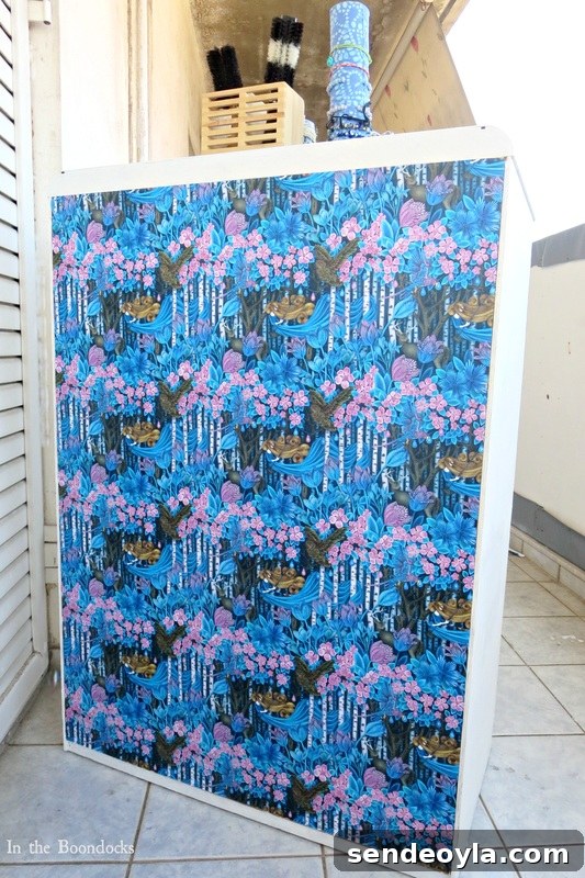 DIY Dresser Makeover: Paint and Decorative Paper Tutorial 12 Mod podged paper on back
