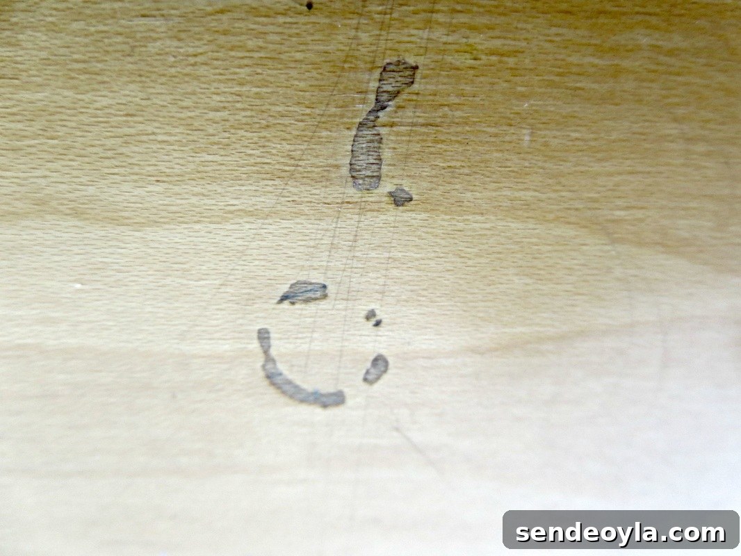 DIY Dresser Makeover: Paint and Decorative Paper Tutorial 5 scratches on dresser