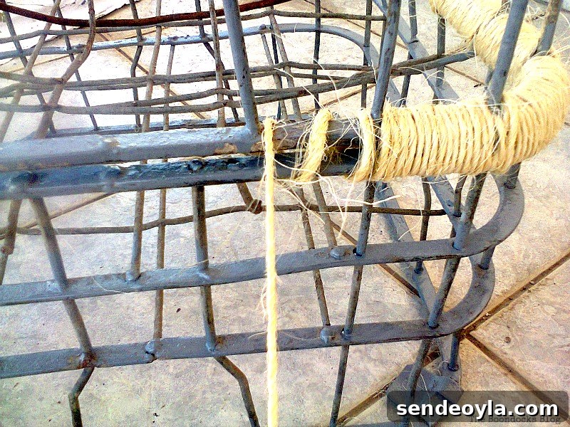 Wrapping the crates together with the twine