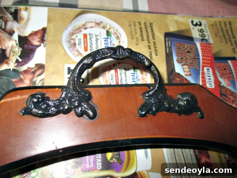 How to Upcycle a Vintage Serving Tray into a Stylish Home Accent 5 One metal handle painted black