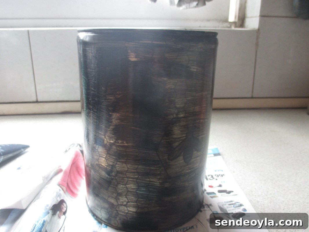 Imperfect Kitchen Utensil Holder with Rustic Charm 3 Painting the honey tin