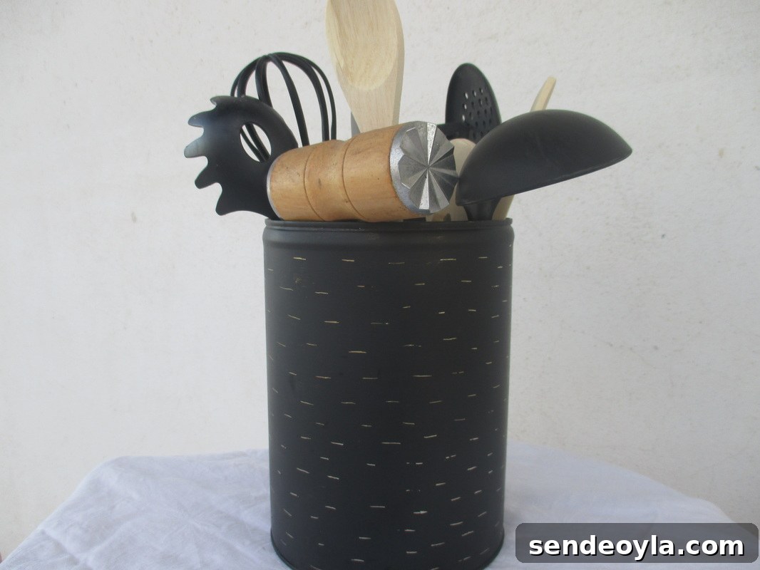 Imperfect Kitchen Utensil Holder with Rustic Charm 8 Close-up of utensils in the tin