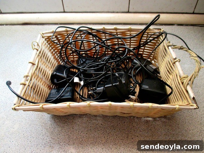 DIY Upcycled Cable Storage Ideas to Tame Wire Clutter 2 Basket with wires, Untangling the wires - www.theboondocksblog.com
