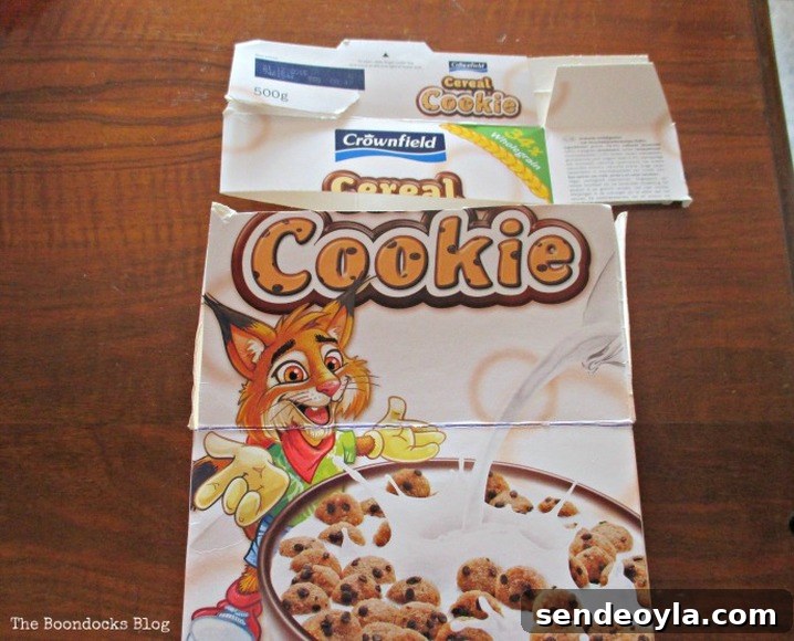 DIY Upcycled Cable Storage Ideas to Tame Wire Clutter 4 cut cereal box into even pieces, untangling the wires - www.theboondocksblog.com