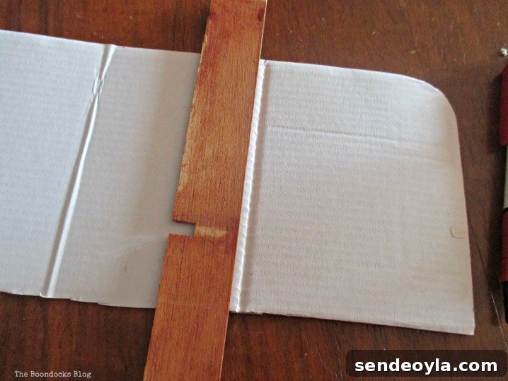 DIY Upcycled Cable Storage Ideas to Tame Wire Clutter 9 cardboard folded into 4, untangling the wires - www.theboondocksblog.com
