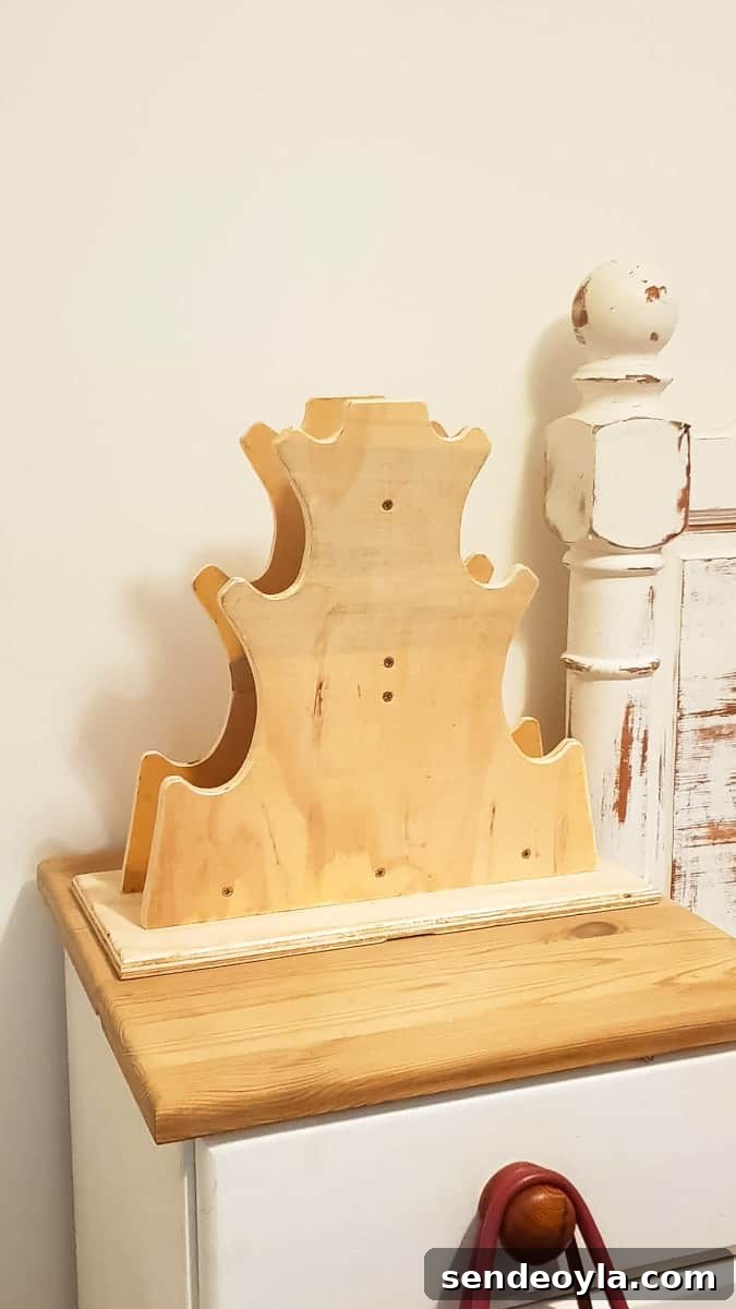 DIY Dumbbell Rack Tree Stand with Free Plans 3 empty plywood wood dumbbell rack