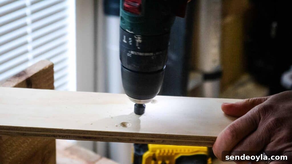 Using a countersunk drill bit to bury screw heads later in wooden supports