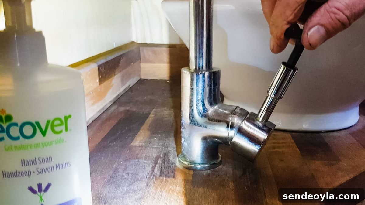 How to Replace a Mixer Tap on a Narrowboat or in Your Home 3 Trying to unscrew a tap handle with an allen key to find it has seized up