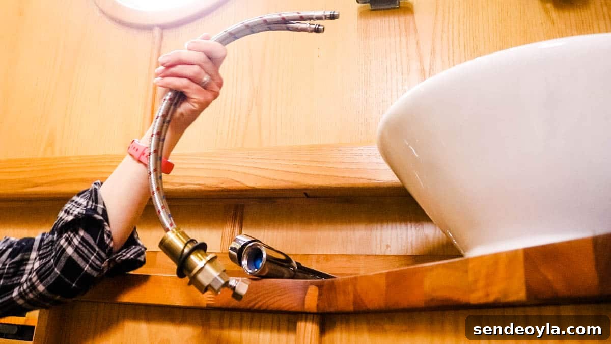 How to Replace a Mixer Tap on a Narrowboat or in Your Home 10 Flexi tails threaded through a screw barrel with nut