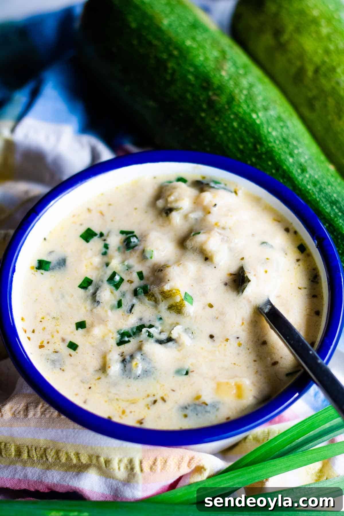 Chunky Keto Zucchini and Cheese Soup 5 Close up of chunky but creamy vegetarian courgette and cheddar soup.