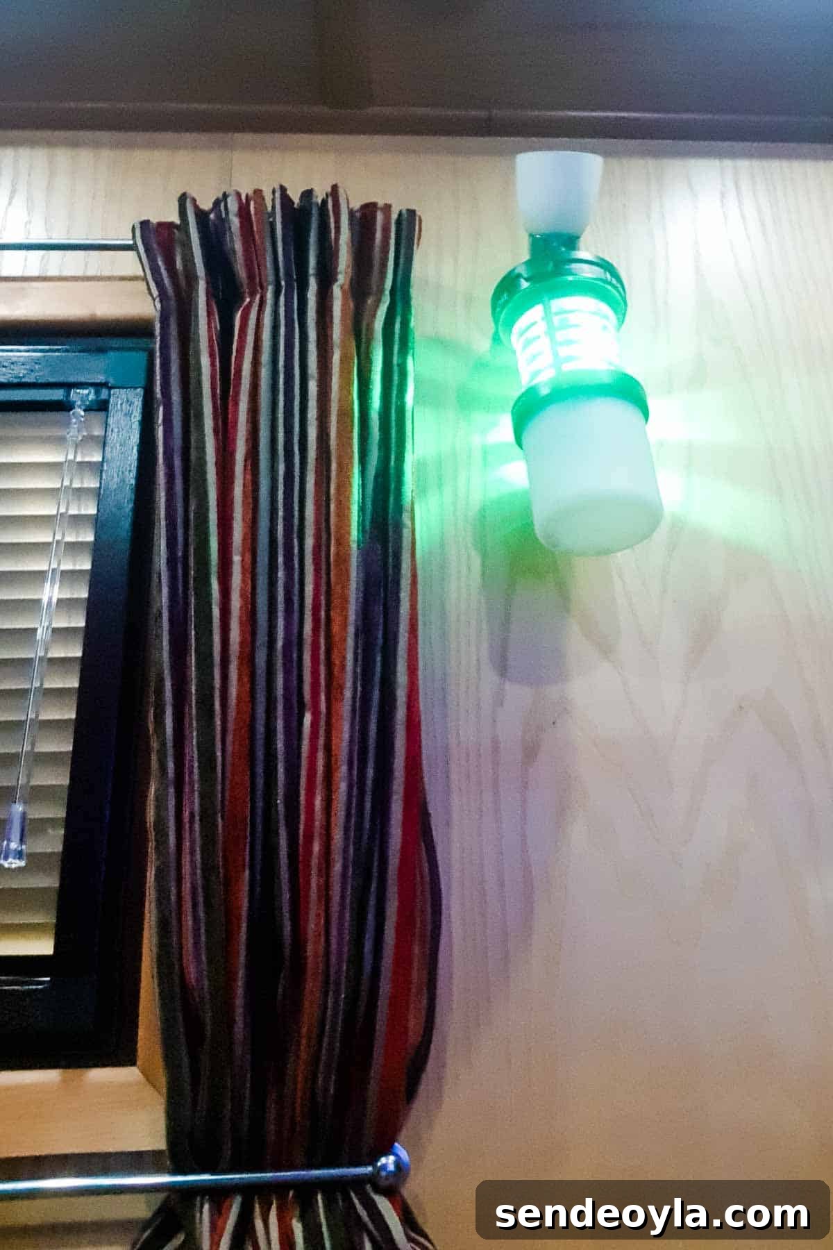Insect-O-Cutor Nomad Fly Killer: Hands-On Review 6 UV light bug killer hanging in a narrowboat from a side light
