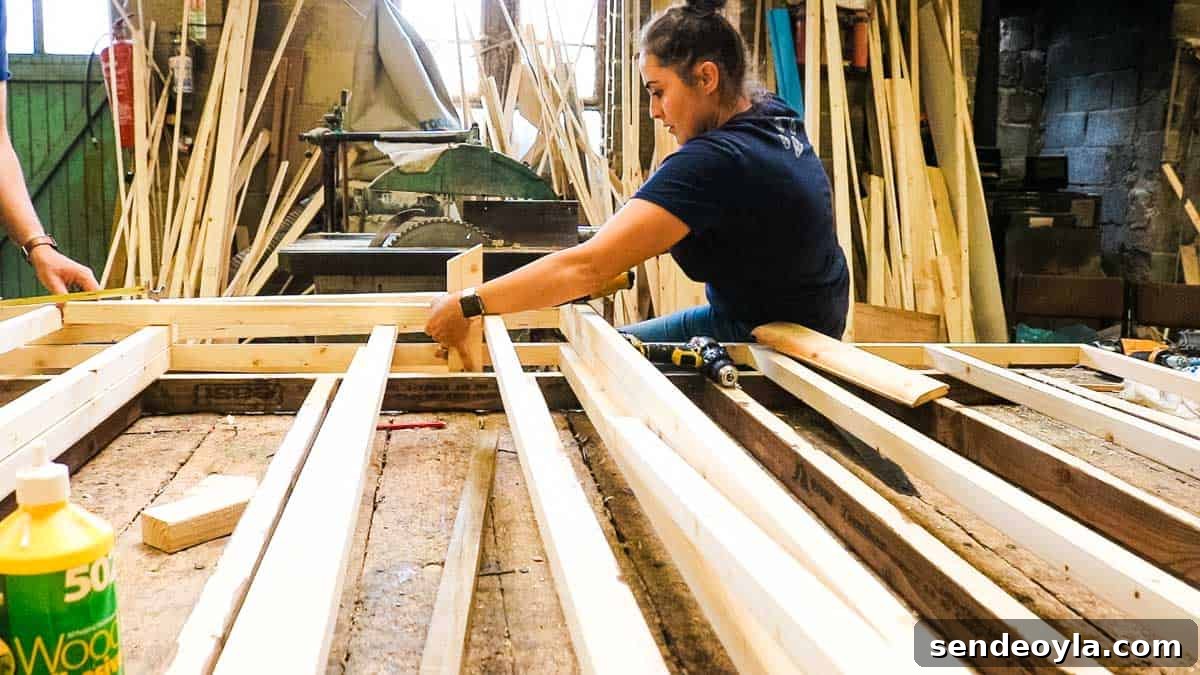 How to Build a Lean-To Shed with Free Plans 11 Screwing top of a shed door opening