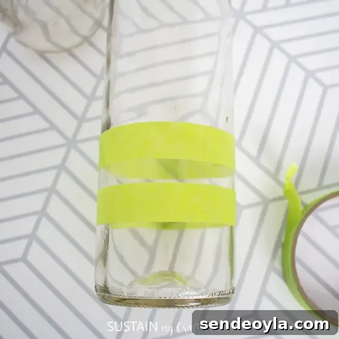 DIY Wine Bottle Holiday Centerpieces 5 Bottles with tape patterns