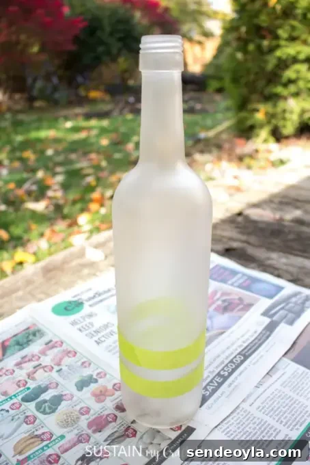 DIY Wine Bottle Holiday Centerpieces 7 Spray painting bottles