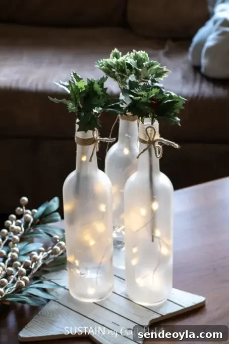 DIY Wine Bottle Holiday Centerpieces 9 Bottles with greenery