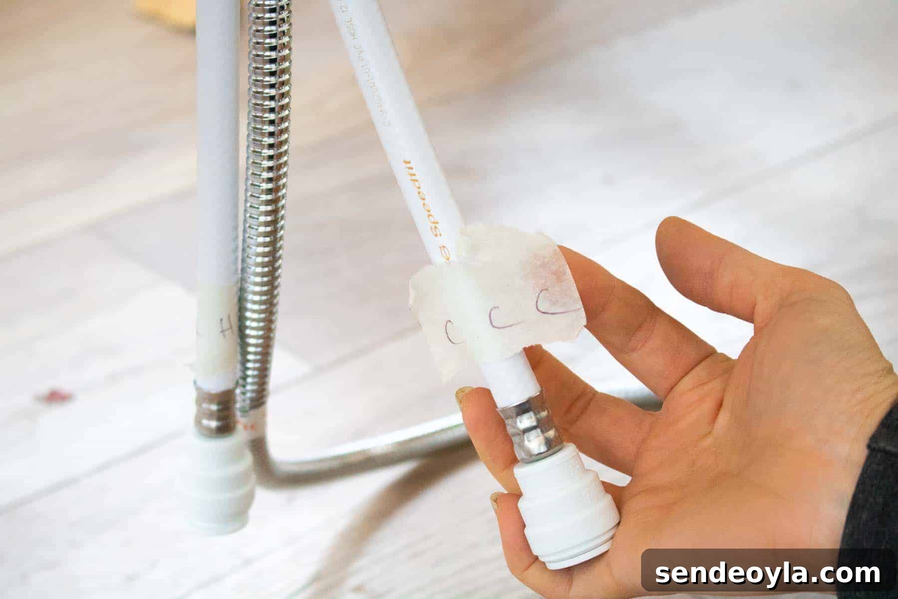 How to Install a Pull-Out Faucet with Speedfit Fittings 9 Labelling hot and cold to speedfit tap hoses