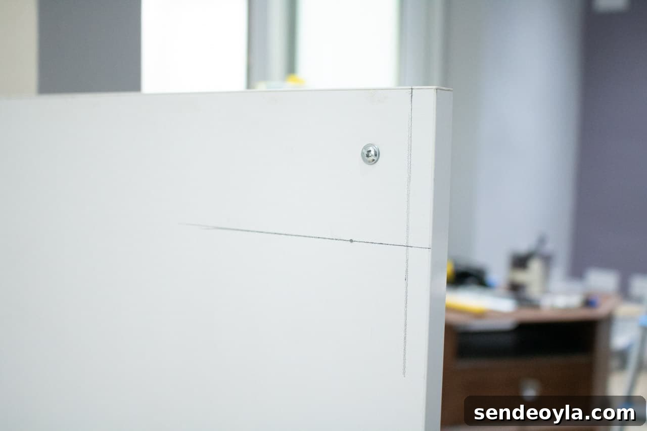 How to Install an Integrated Fridge-Freezer Door Slider 6 Criss cross of pencil lines from combination square
