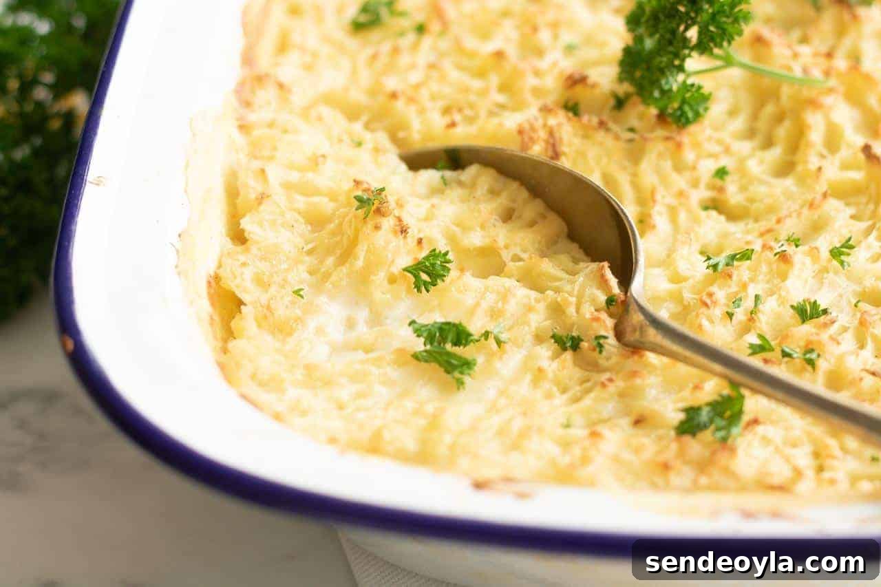 Fish Pie Recipe with Lemon Dill Cream Sauce 4 Spoon in healthy fish pie's mashed potato topping