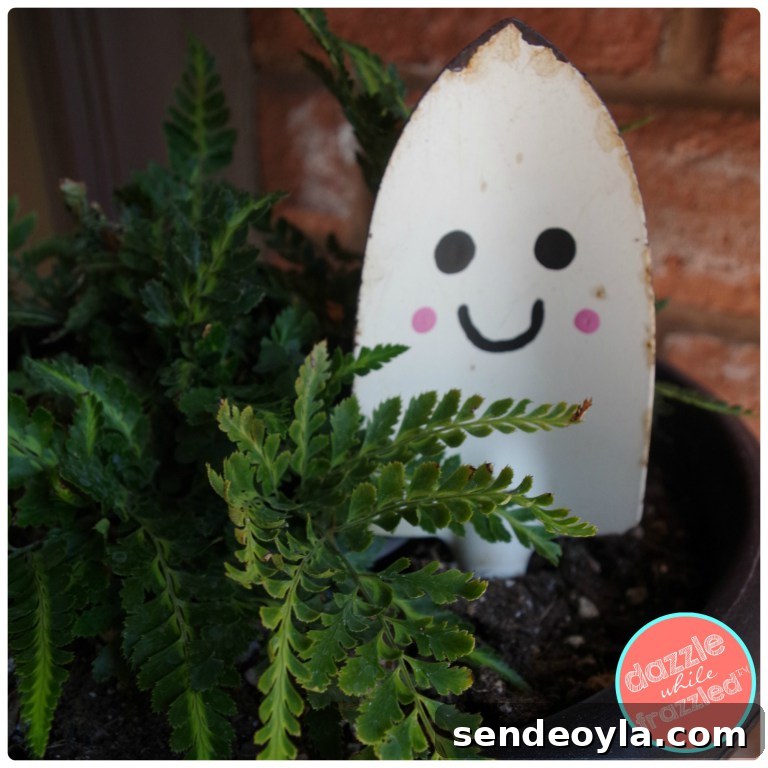 DIY Halloween Decorations from 20 Household Items 13 Garden shovel as ghost from Dazzled While Frazzled, 15 Household Items Re-purposed for Halloween Decor www.theboondocksblog.com