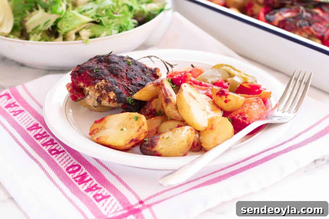 baked chicken dinner traybake on a plate 