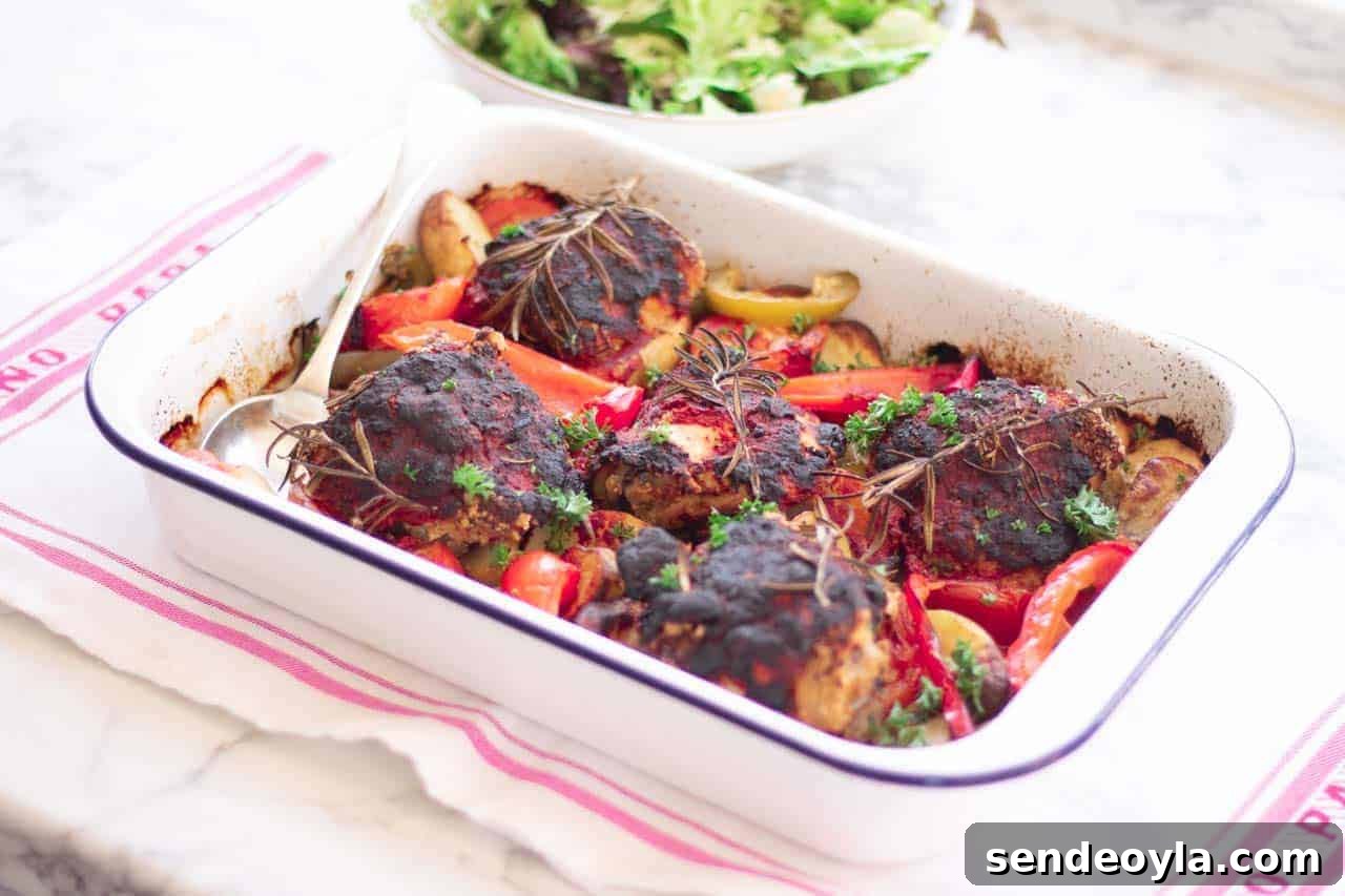 cooked chicken in a traybake, ready to serve