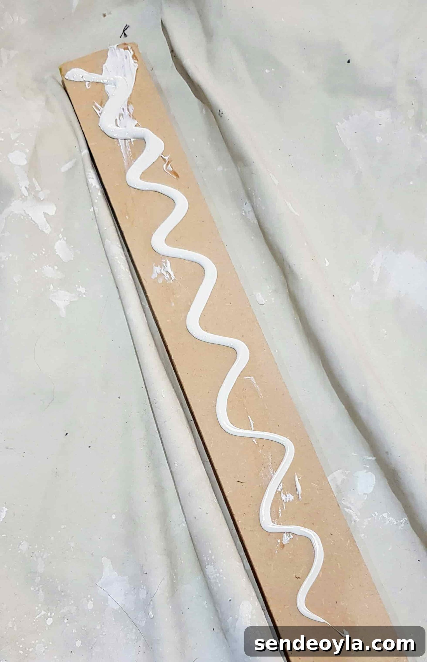 How to Install a Curtain Pole Batten with Grab Adhesive 9 glued up squiggle of sticks like sh*t on curtain pole batten