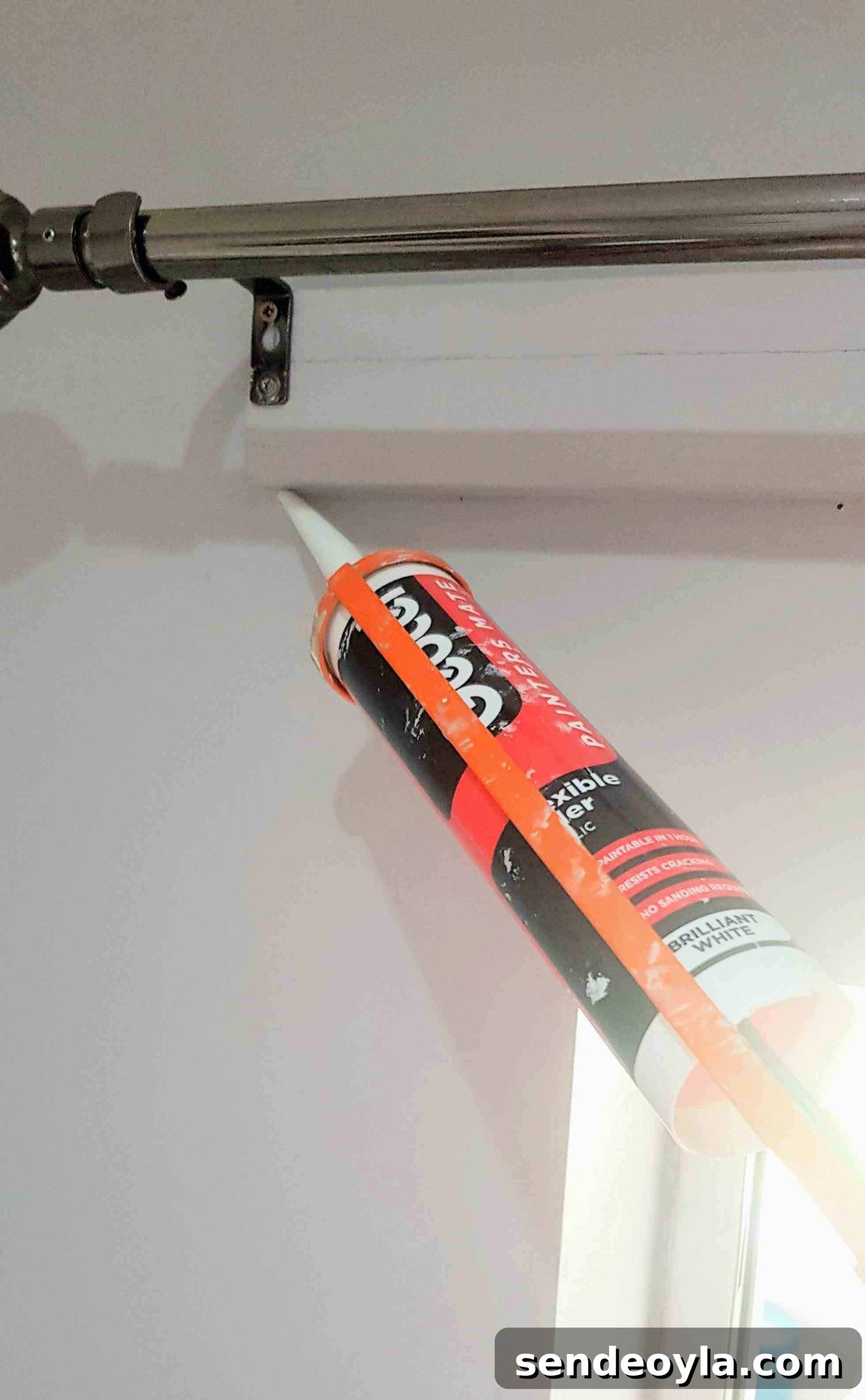 How to Install a Curtain Pole Batten with Grab Adhesive 12 caulking with Painters Mate flexible decorators caulk.