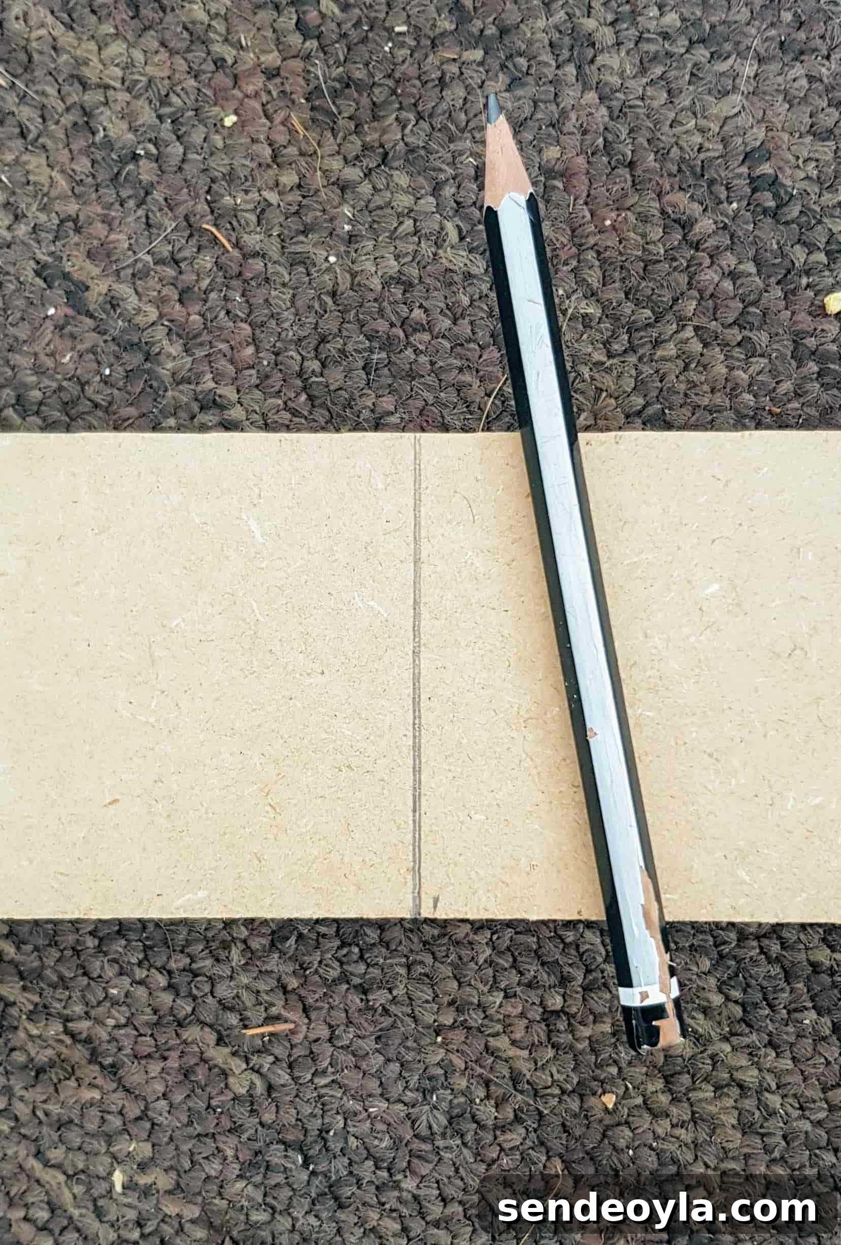How to Install a Curtain Pole Batten with Grab Adhesive 7 measuring centre point of curtain pole batten