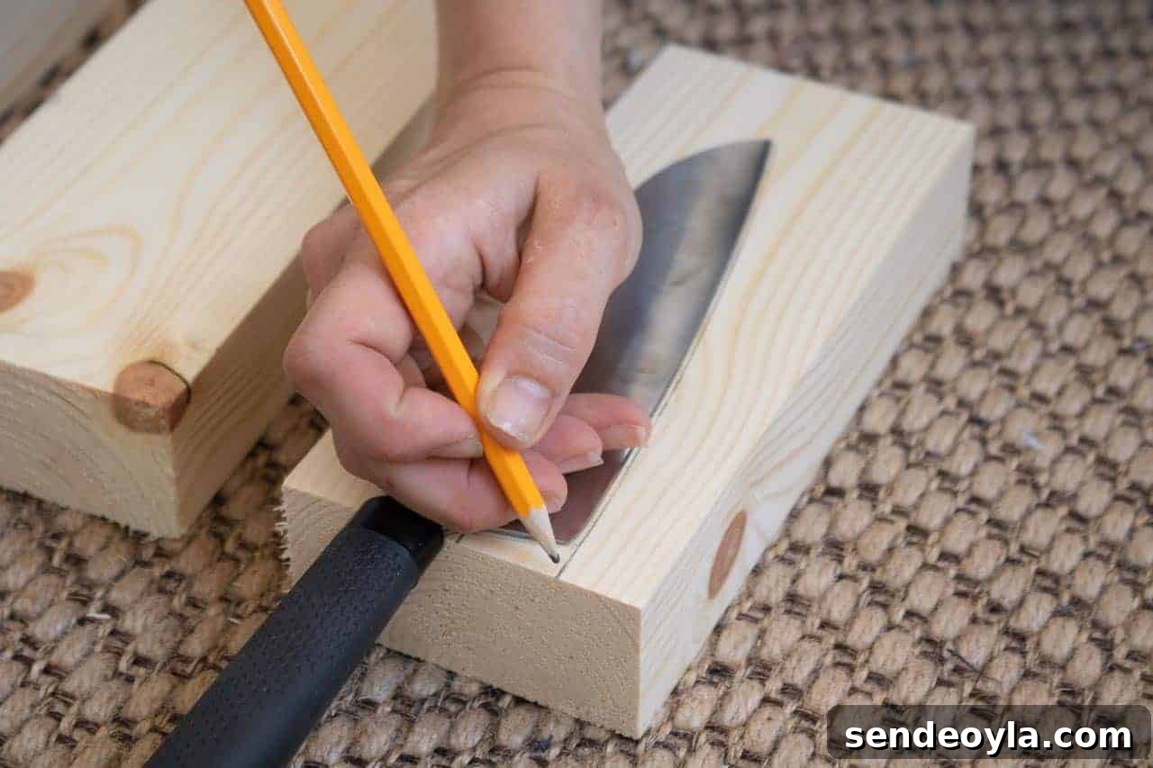 How to Build a Custom Wooden Knife Block Set 8 drawing around a carving knife to make a block