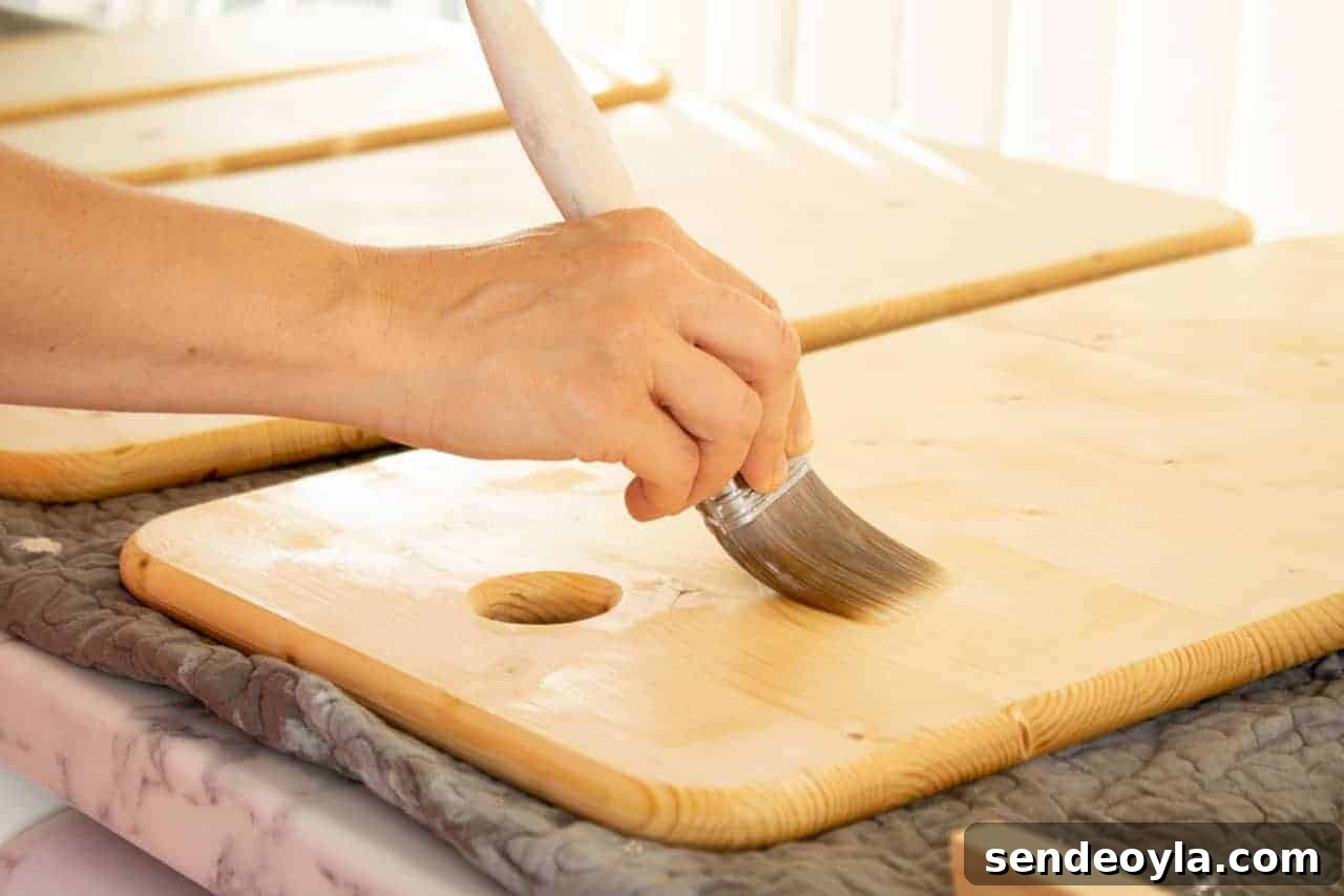 DIY Chopping Board Set with Built-In Spaghetti Measure 14 brushing protective worktop oil on chopping board to prevent stains and water damage