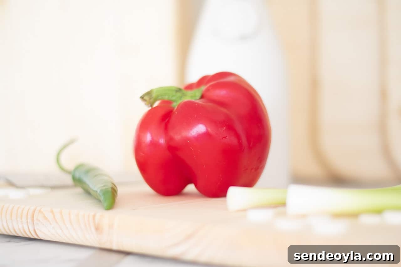 DIY Chopping Board Set with Built-In Spaghetti Measure 17 close up of red pepper, green chilli and spring onions on chopping board