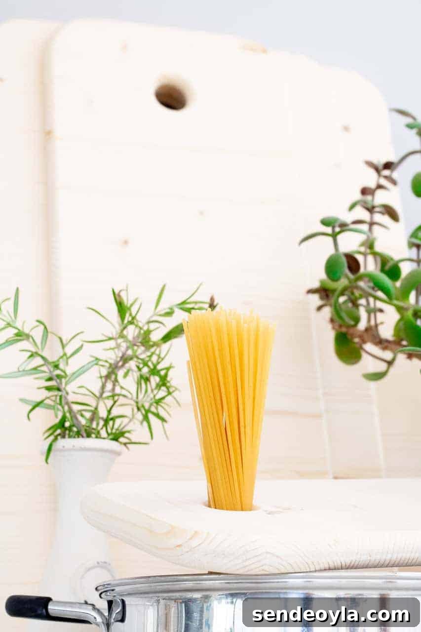 DIY Chopping Board Set with Built-In Spaghetti Measure 3 Single serving of spaghetti using a built in measure on chopping board