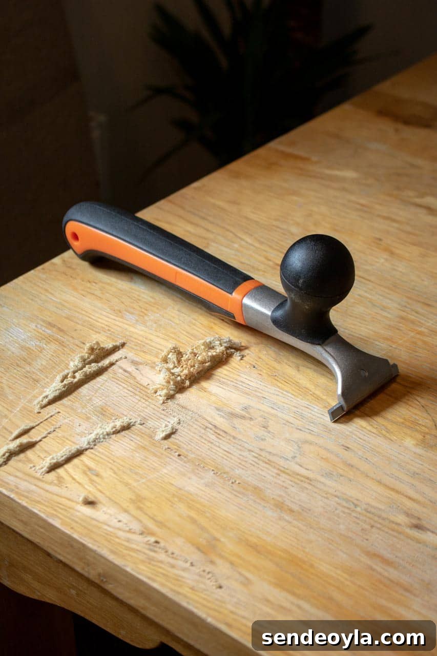 Refinish Oak Furniture: DIY Restoration Guide 5 scraped oak shavings from Bahco carbide scraper
