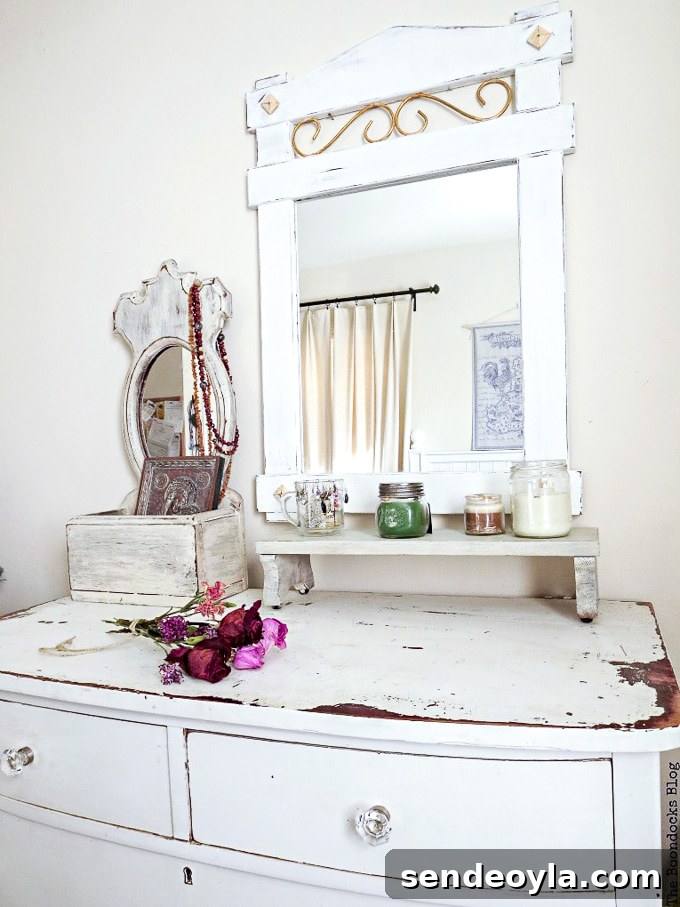 Curbside Mirror Makeover: Revamp Thrifted Mirrors 2 Wood mirror painted with chalky finish paint and gold metallic paint, distressed and waxed for a vintage farmhouse look, #mirrormakeover #distressedlook #vintagelook #farmhousestyle #lazyDIY #curbsidefind #chalkyfinishpaint How to Makeover a Curbside Mirror the Lazy Way www.theboondocksblog.com