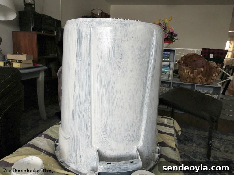 DIY Airtight Dog Food Storage Container 5 Painting bottom of bucket with white paint.