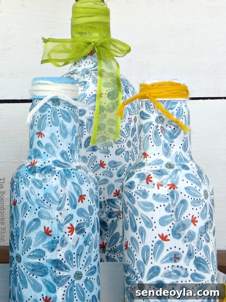 Plastic bottles decoupaged with napkins