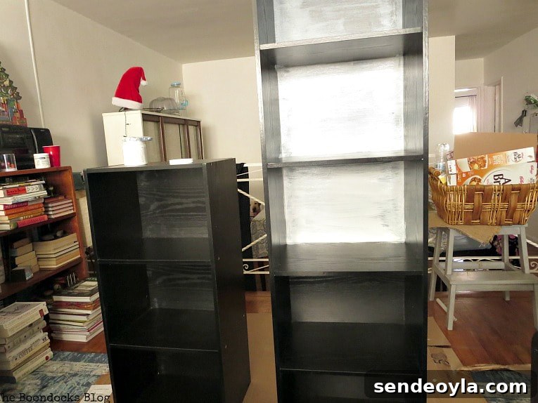 one coat of paint on black cubby storage