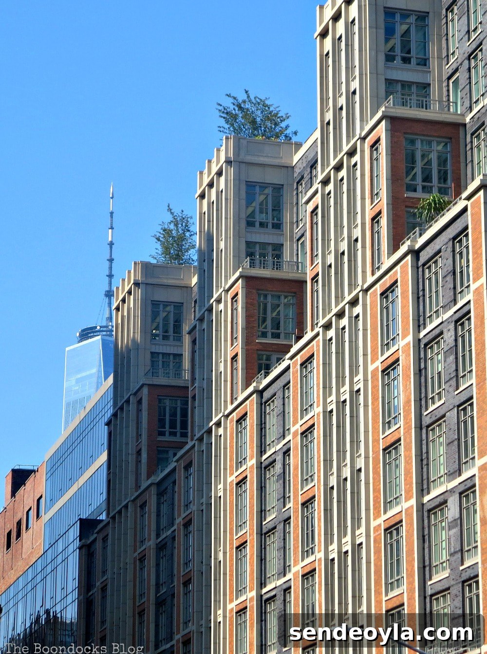 Tall buildings in Hudson Square with spiral of One World Trade Center, A monumental Surprise at Hudson Square in New York, www.theboondocksblog.com
