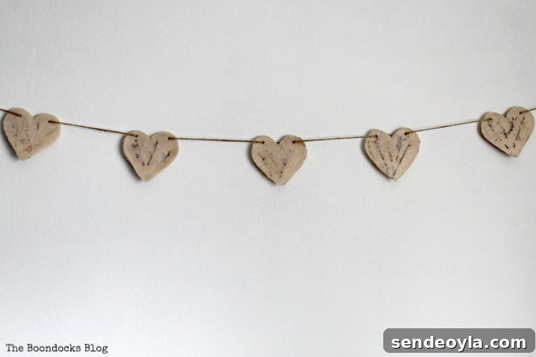 Finished heart garland hung on a wall