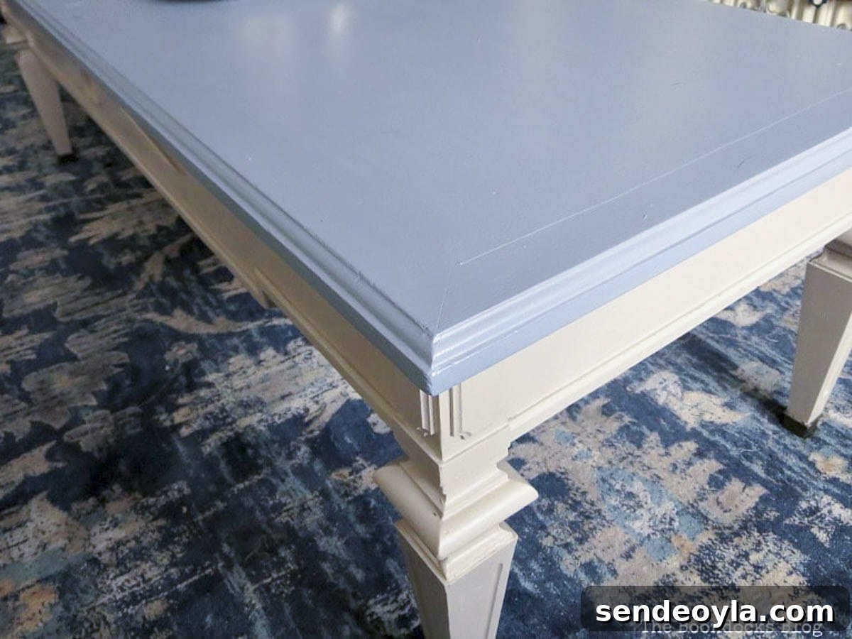 DIY Thrifted Coffee Table Makeover for a Modern Home 10 Blue tabletop with coordinating blue rug