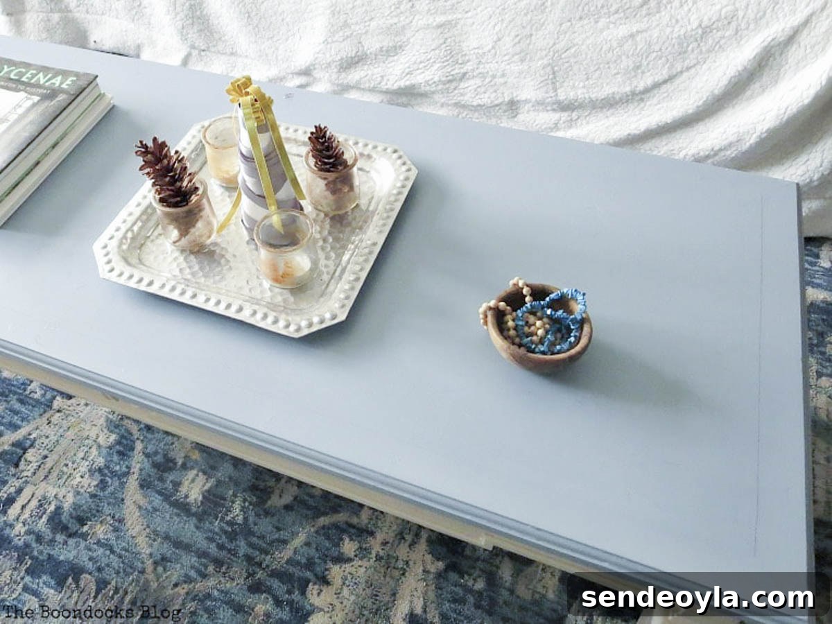 DIY Thrifted Coffee Table Makeover for a Modern Home 12 Finished wood coffee table with blue top and beige base
