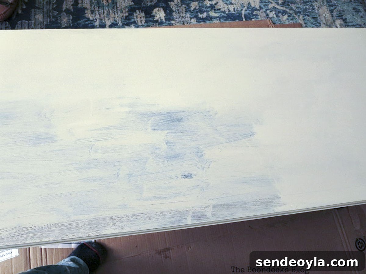 DIY Thrifted Coffee Table Makeover for a Modern Home 5 Top of vintage coffee table painted beige
