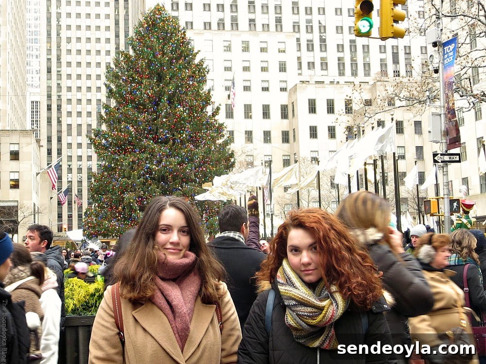 My daughters in front of the tree, A Visit to the Spectacular Tree at Rockefeller Center www.theboondocksblog.com