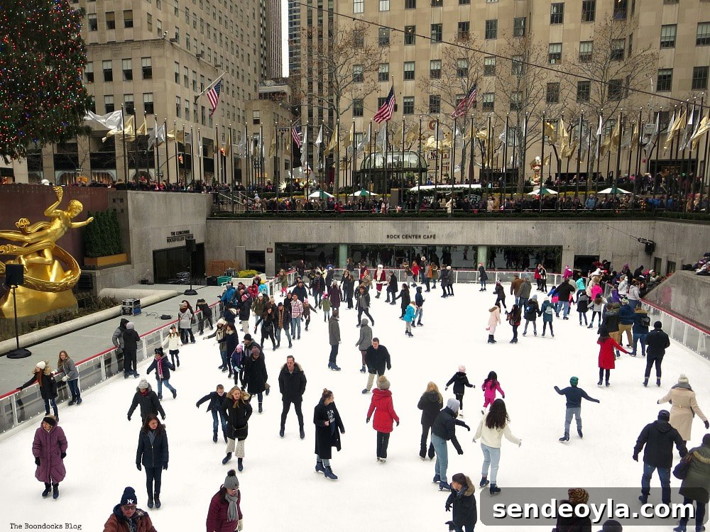 Skaters in the sunken plaza which has been turned into an ice rink, A Visit to the Spectacular Tree at Rockefeller Center www.theboondocksblog.com